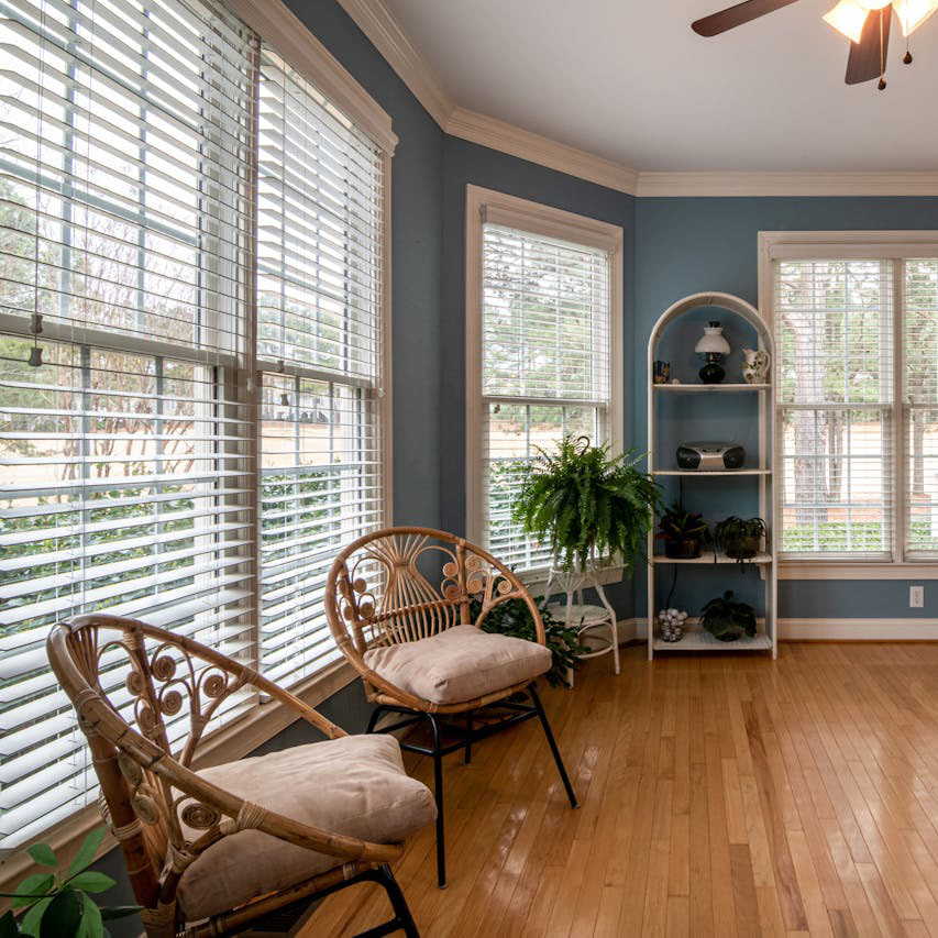 Cozy modern home in Wisconsin with window blinds installed by Ultimate Living Spaces - Window Treatment Installation Company Wisconsin
